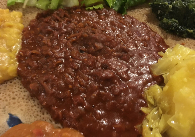 Red lentils, aka misr wot, are the spiciest element of the vegetarian combination. BRIAN SANDFO ...