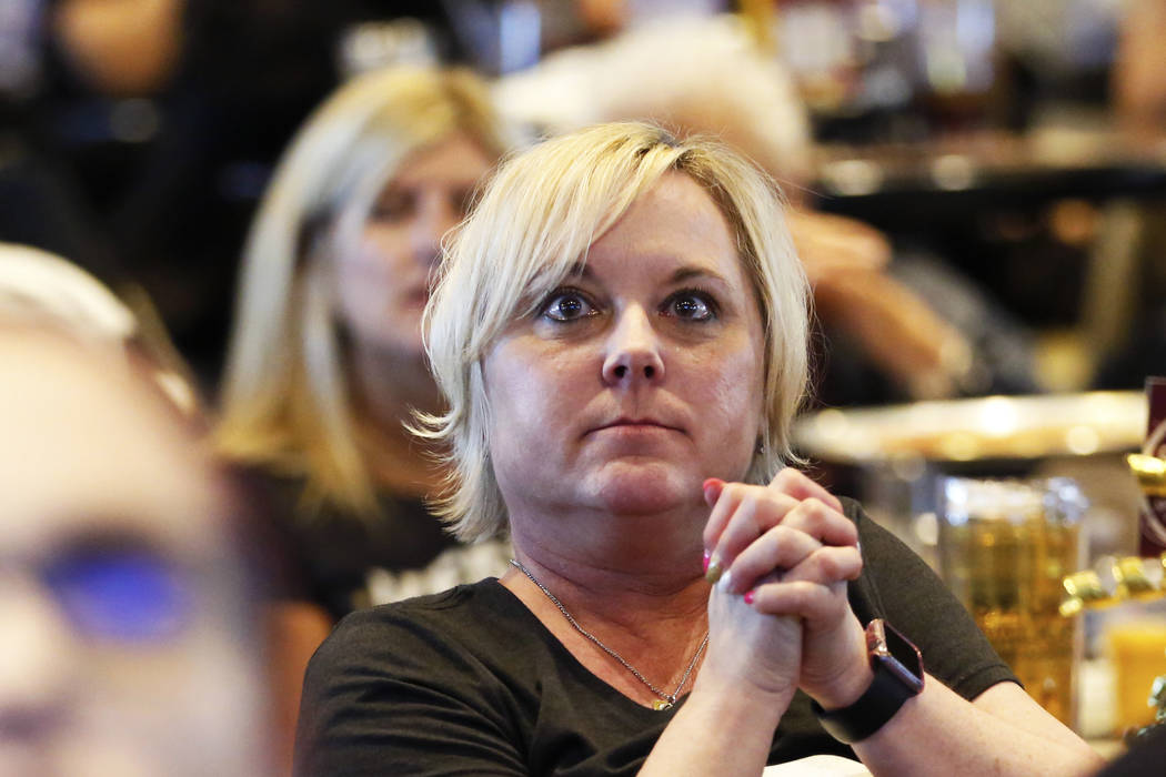Holly Spicer, of Las Vegas, watches the Vegas Golden Knights play against the Winnipeg Jets dur ...