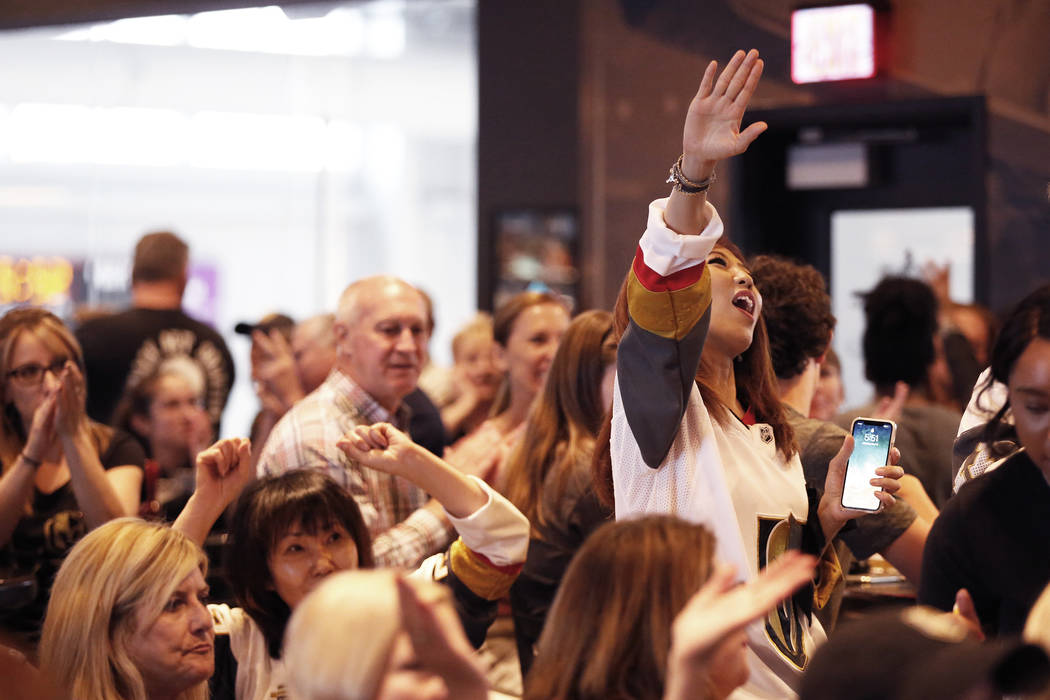 Vegas Golden Knight fans watch the the second game of the Western Conference Final against the ...