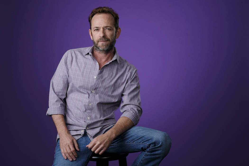 Luke Perry, a cast member in the CW series "Riverdale," poses for a portrait during the 2018 Television Critics Association Summer Press Tour, Monday, Aug. 6, 2018, in Beverly Hills, Cal ...