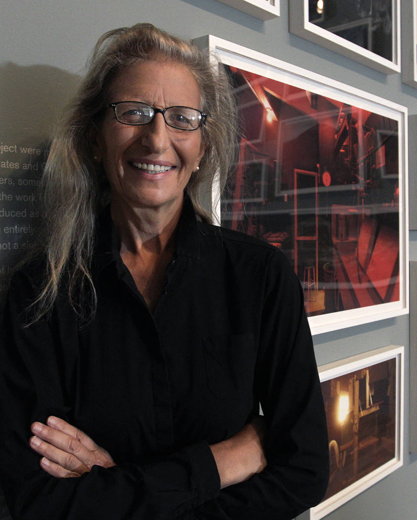 Annie Leibovitz stands near some of her work before the opening of her exhibition at the Wexner ...