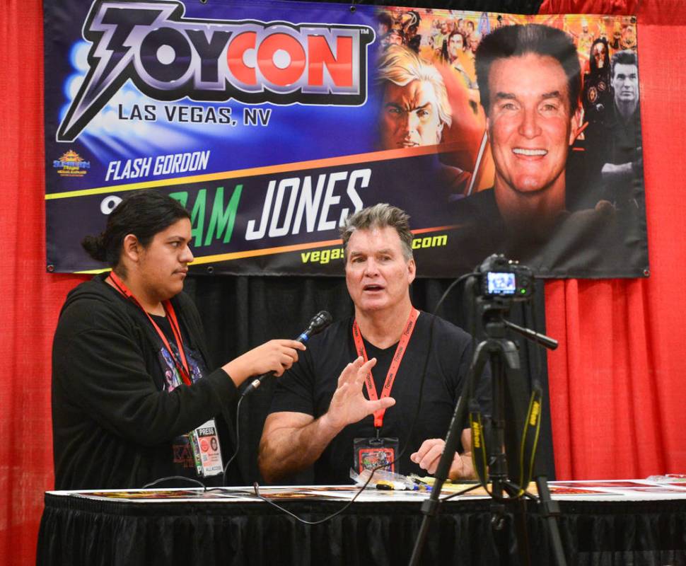 Sam Jones, who played Flash Gordon in the 1980 movie Flash Gordon, gives an interview Las Vegas Toy and Comic Convention at the Westgate Resort and Casino in Las Vegas, on Sunday, March 3, 2019. T ...