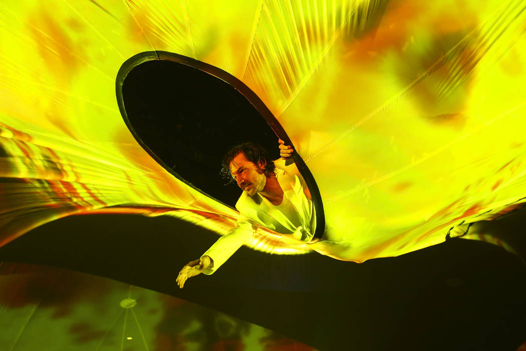 Cast members in "Fuerza Bruta" perform as part of a media preview at the show's tent ...