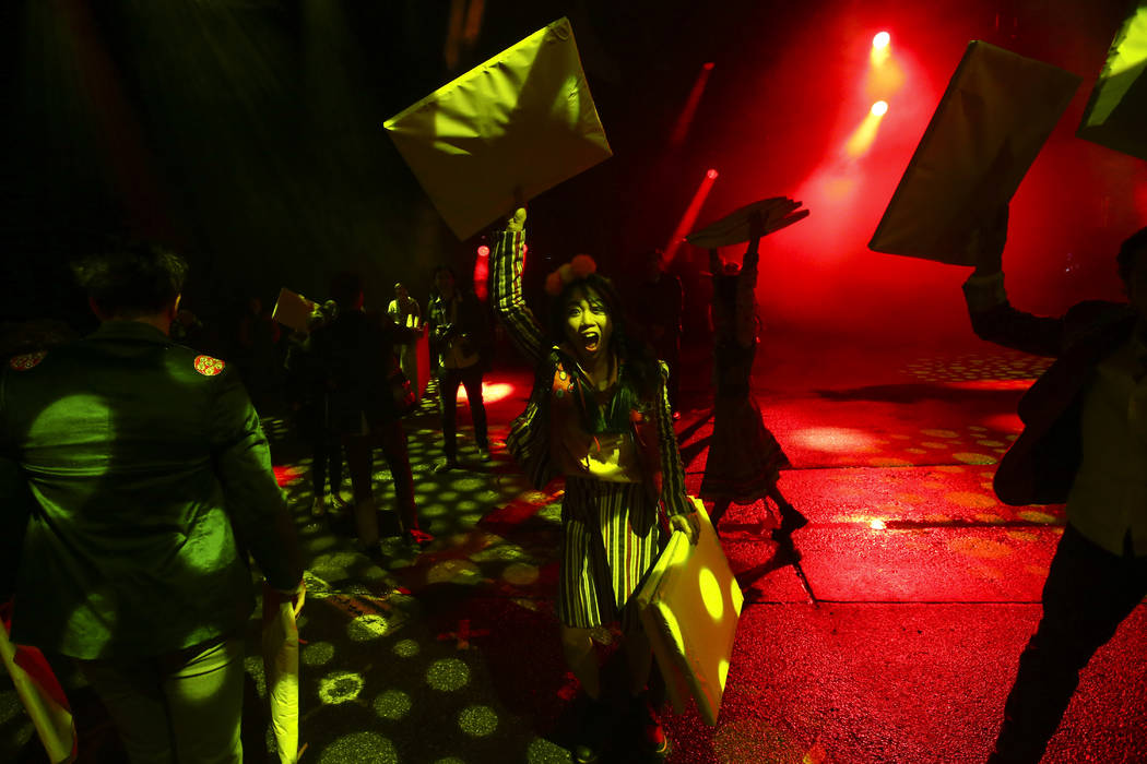 Cast members in "Fuerza Bruta" perform as part of a media preview at the show's tent ...