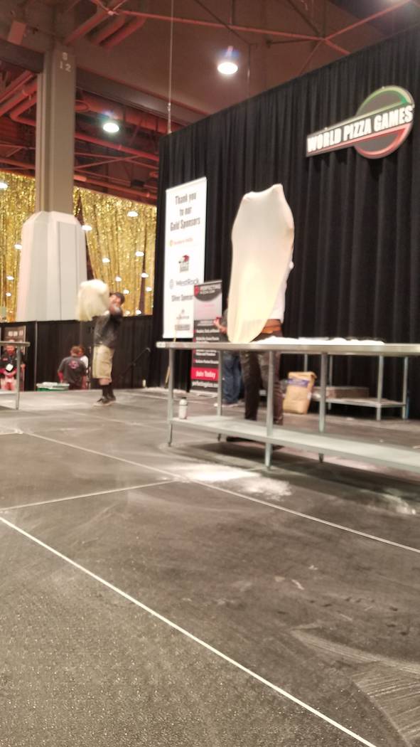 Competition in the Largest Stretch contest at the International Pizza Expo on Wednesday, March 6, 2019, at the Las Vegas Convention Center. Heidi Knapp Rinella/Las Vegas Review-Journal