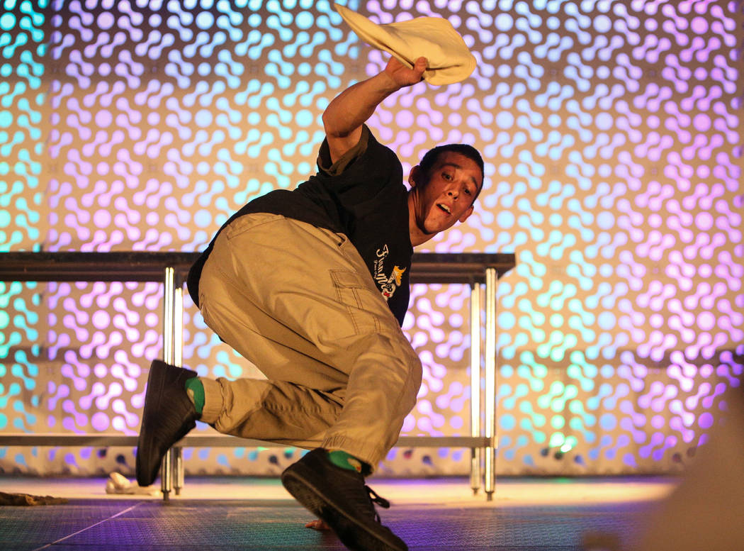Scott Volpe from Arizona competes in the dough-tossing championship of the International Pizza Expo at the Las Vegas Convention Center in Las Vegas, Wednesday, March 6, 2019. (Caroline Brehman/Las ...