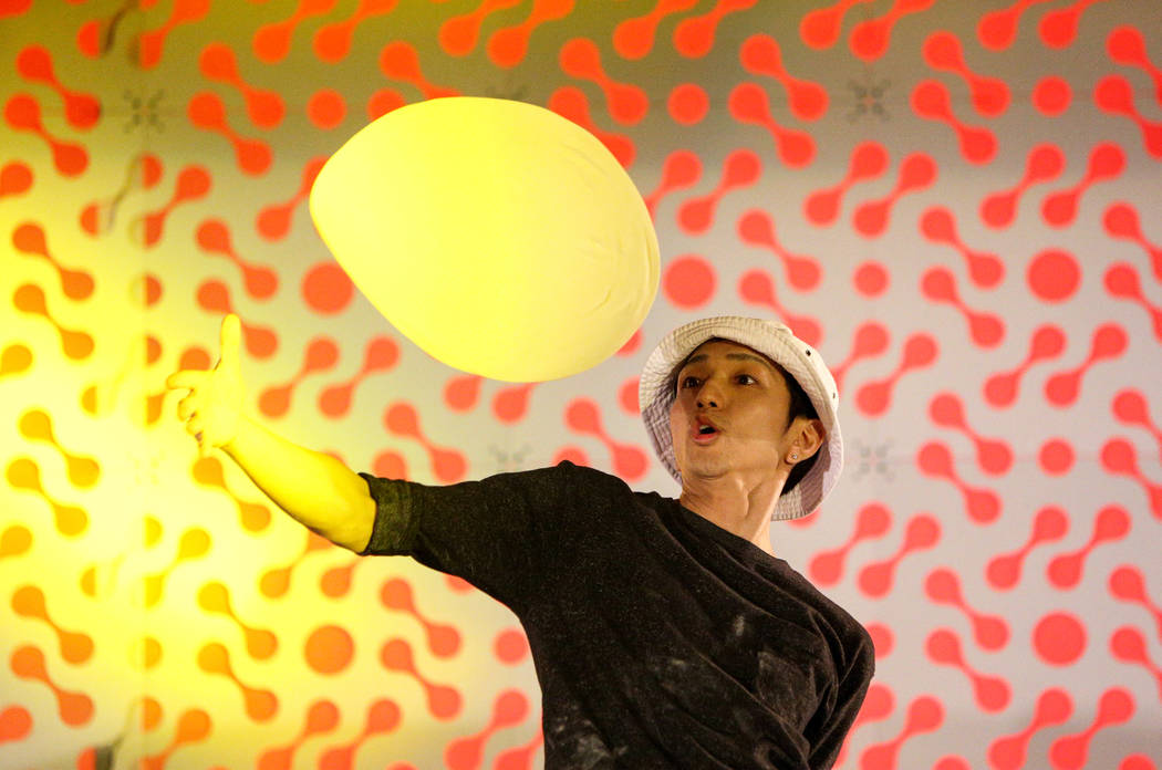 Takumi Tachikawa from Japan competes in the dough-tossing championship of the International Pizza Expo at the Las Vegas Convention Center in Las Vegas, Wednesday, March 6, 2019. (Caroline Brehman/ ...