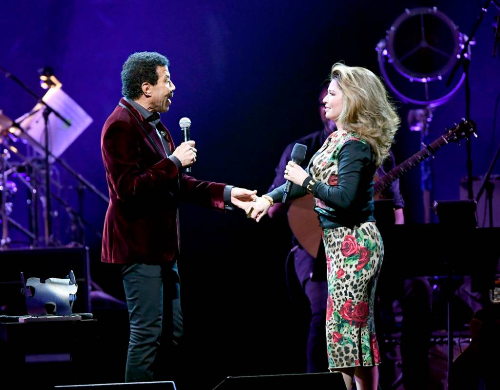 Lionel Richie and Shania Twain speak during the 23rd annual Keep Memory Alive 'Power of Love Gala' benefit for the Cleveland Clinic Lou Ruvo Center for Brain Health at MGM Grand Garden Arena on Ma ...