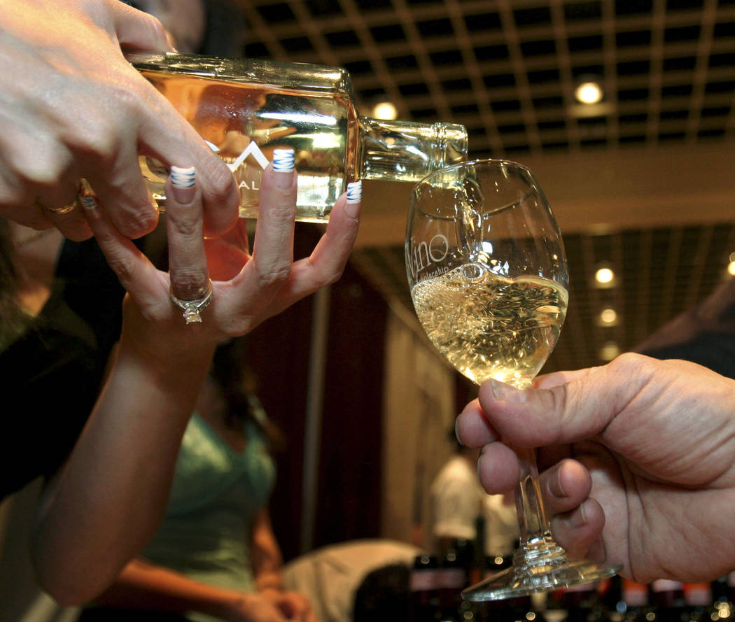 SE/VIEW--The 32nd annual UNLVino wine tasting event sponsored by Southern Wine & Spirits of Nevada and the WIlliam F. Harrah College of Hotel Administration at UNLV. This year's event drew tho ...