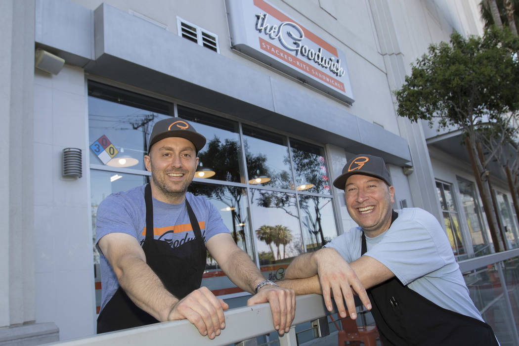 The Goodwich co-owners Joshua Clark, left, and Theo van Soest pose outside their sandwich shop ...