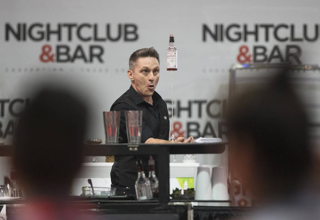 Ryan Clark performs in the flair bartending competition at the Nightclub and Bar Show on Tuesday, March 26, 2019, at the Las Vegas Convention Center, in Las Vegas. (Benjamin Hager Review-Journal) ...