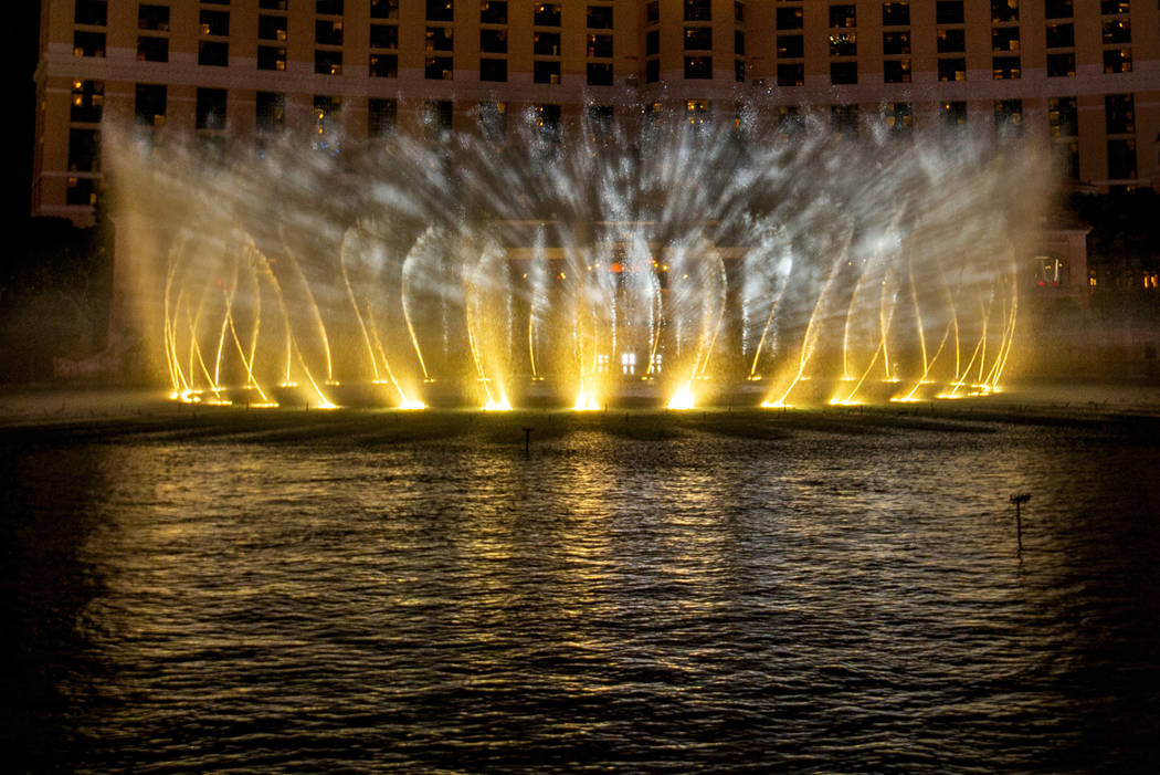 Snow falls during the debut of the new water show based on "Game of Thrones" at the B ...