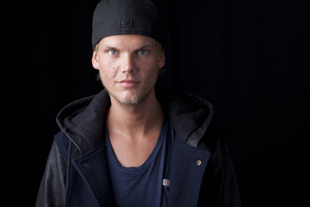 FILE - In this Aug. 30, 2013 file photo, Swedish DJ, remixer and record producer Avicii poses f ...