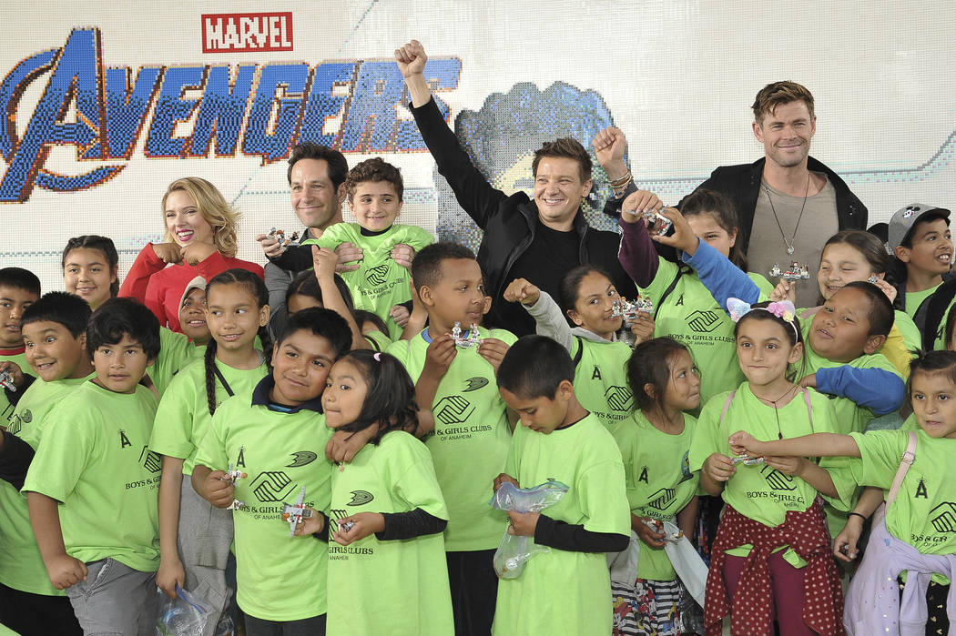 Actors Scarlett Johansson, background from left, Paul Rudd, Jeremy Renner and Chris Hemsworth, ...