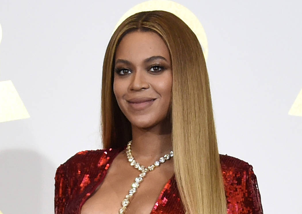 FILE - In this Feb. 12, 2017 file photo, Beyonce poses in the press room at the 59th annual Gra ...