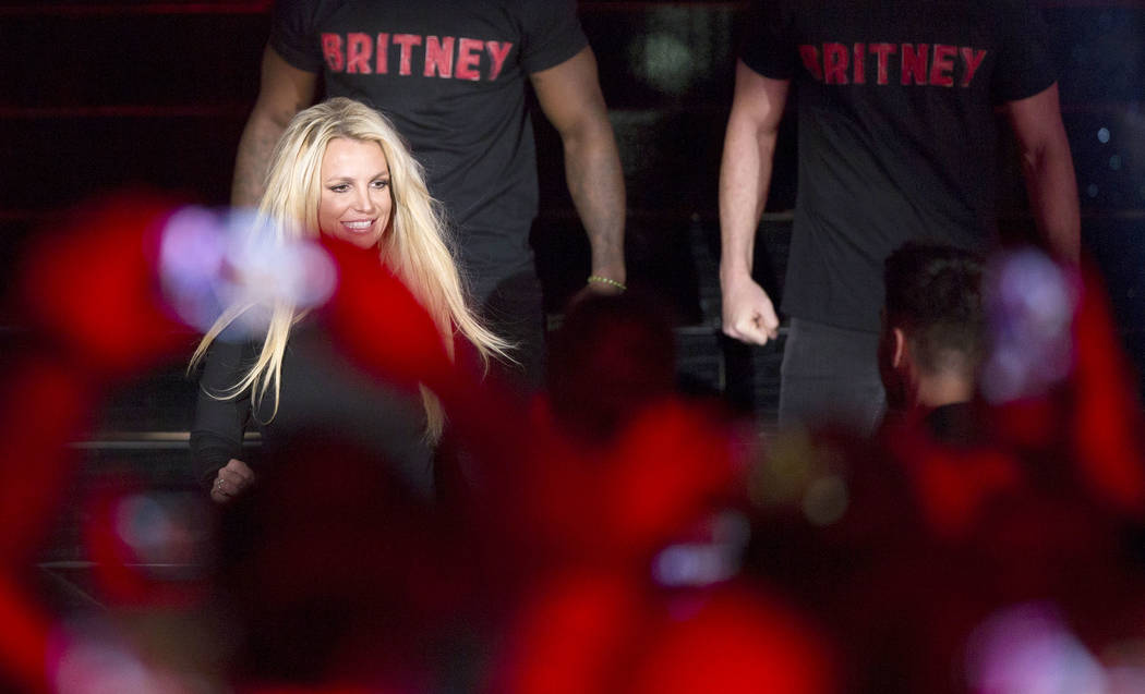 Britney Spears signs autographs during an event to announce her new residency at The Park Theat ...