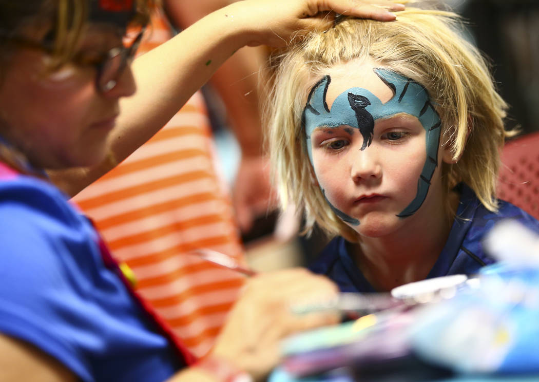 Christian LeMone, 5, of Las Vegas, gets his face painted during the 10th annual Dia del Nino ev ...