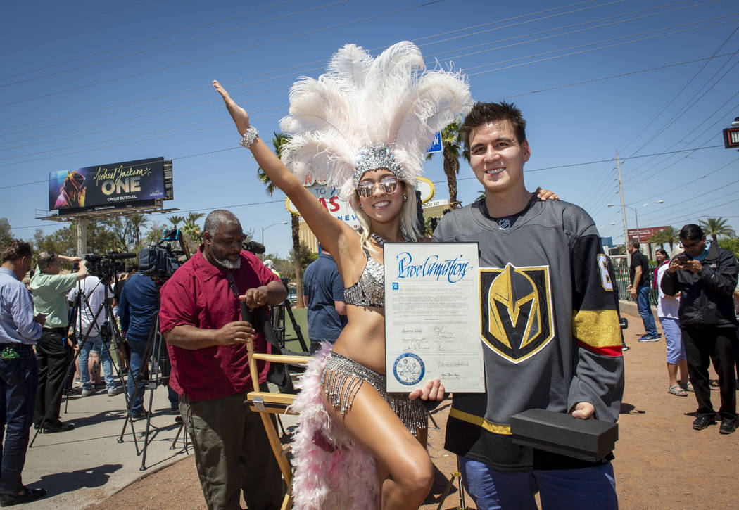 Heather Neckritz, left, poses for a photograph with "Jeopardy!" sensation James Holzh ...