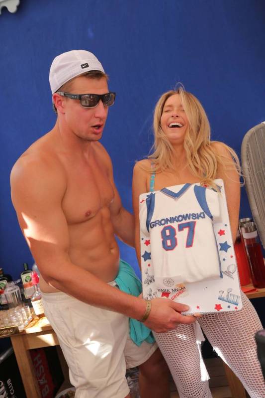 Ex-New England Patriots tight end Rob Gronkowski and his girlfriend, Camille Kostek, are shown ...
