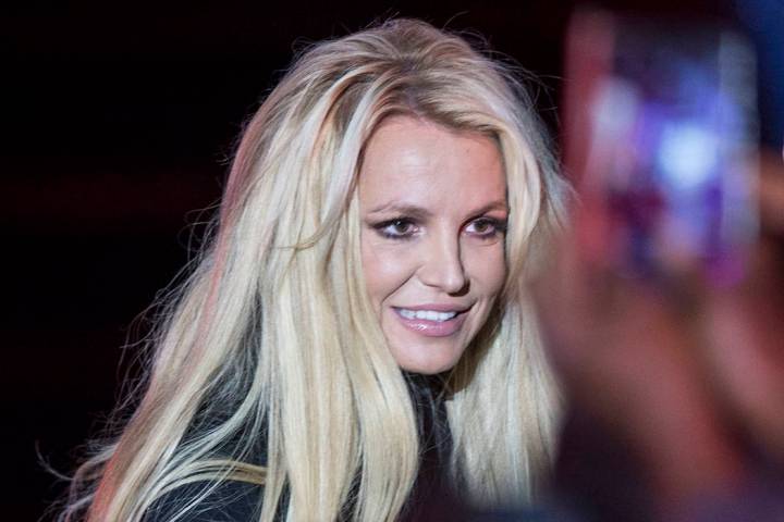 Britney Spears signs autographs during an event to announce her new residency at The Park Theat ...