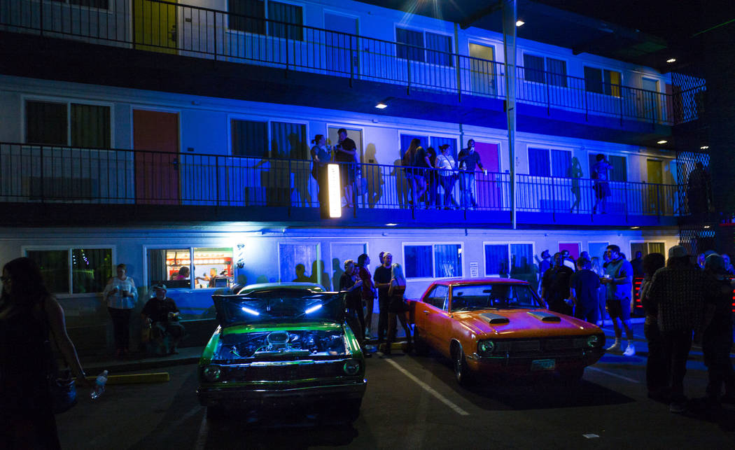 Attendees explore Jack Daniel's House No. 7, a pop-up experience at the Thunderbird Boutique Ho ...