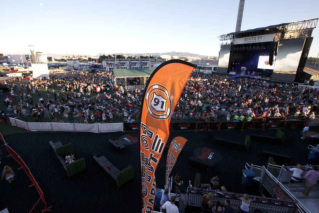 Fans listen to Dustin Lynch perform at the Route 91 Harvest country music festival at the MGM R ...