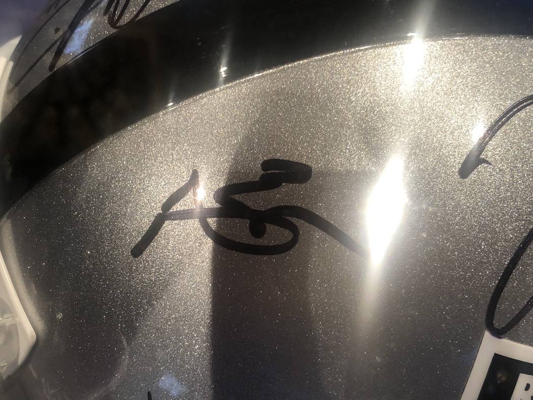 Antonio Brown's signature is shown on a Raiders' helmet at the sixth annual TRF Gala on Friday, ...