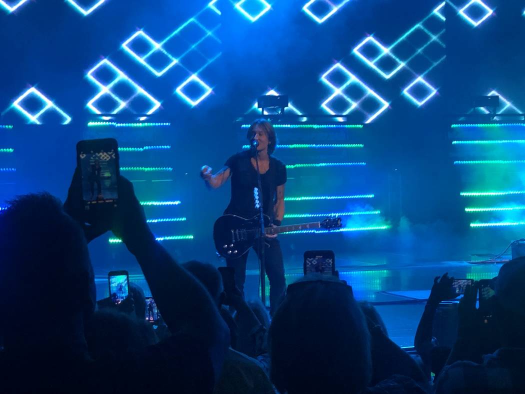 Keith Urban is shown during his "Graffiti U" tour stop at the Colosseum at Caesars Palace on Sa ...