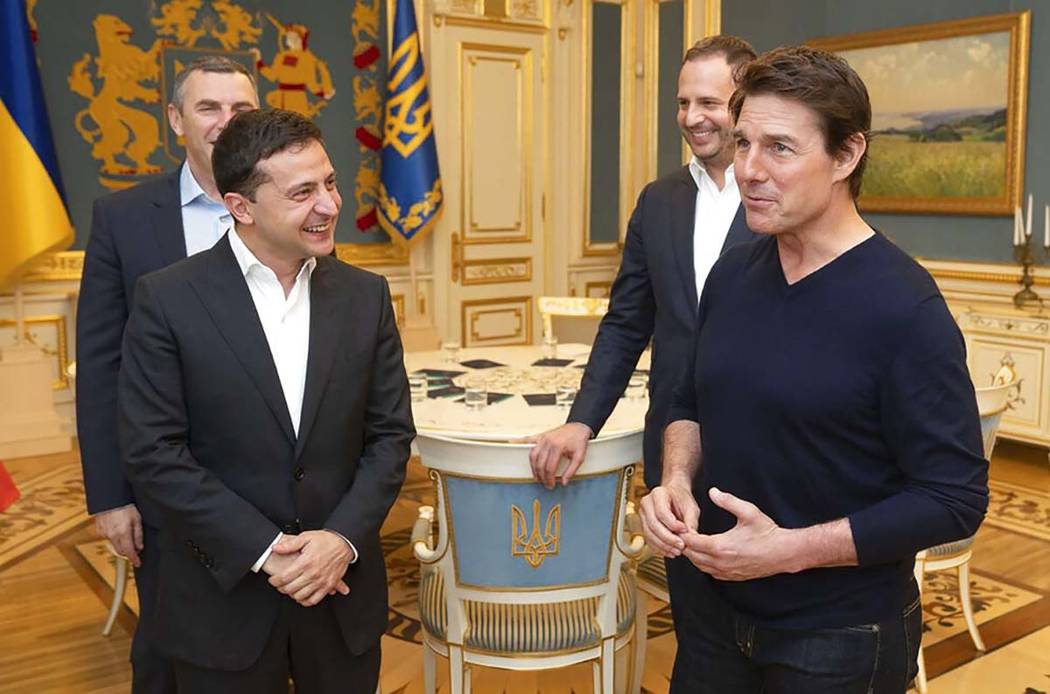 Ukrainian President Volodymyr Zelenskiy and American actor, film director and producer Tom Crui ...