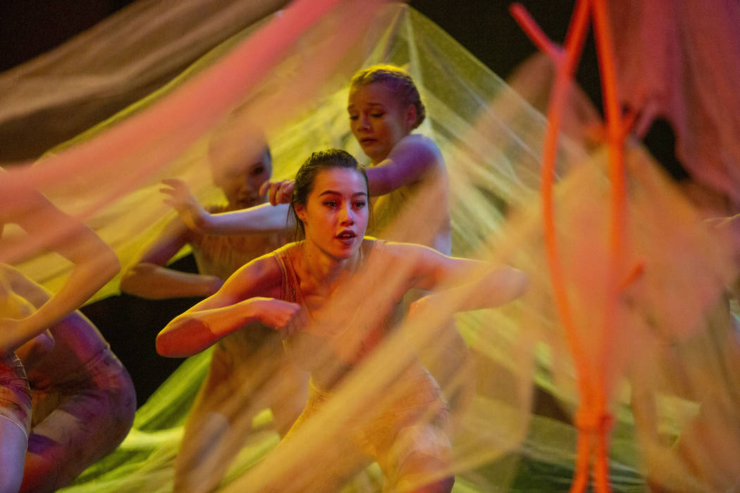 Dancers with Cirque du Soleil and the Nevada Ballet Theatre perform a routine while rehearsing ...