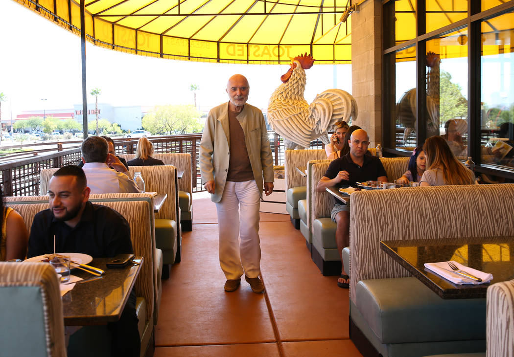 Sami Ladeki, owner of Toasted Gastrobrunch, checks on his customers at 9516 W. Flamingo Road on ...