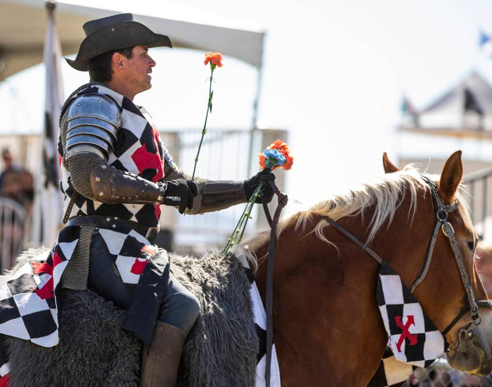Sir Anthony the Black Knight looks to give flowers to maidens enjoying the battles taking place ...
