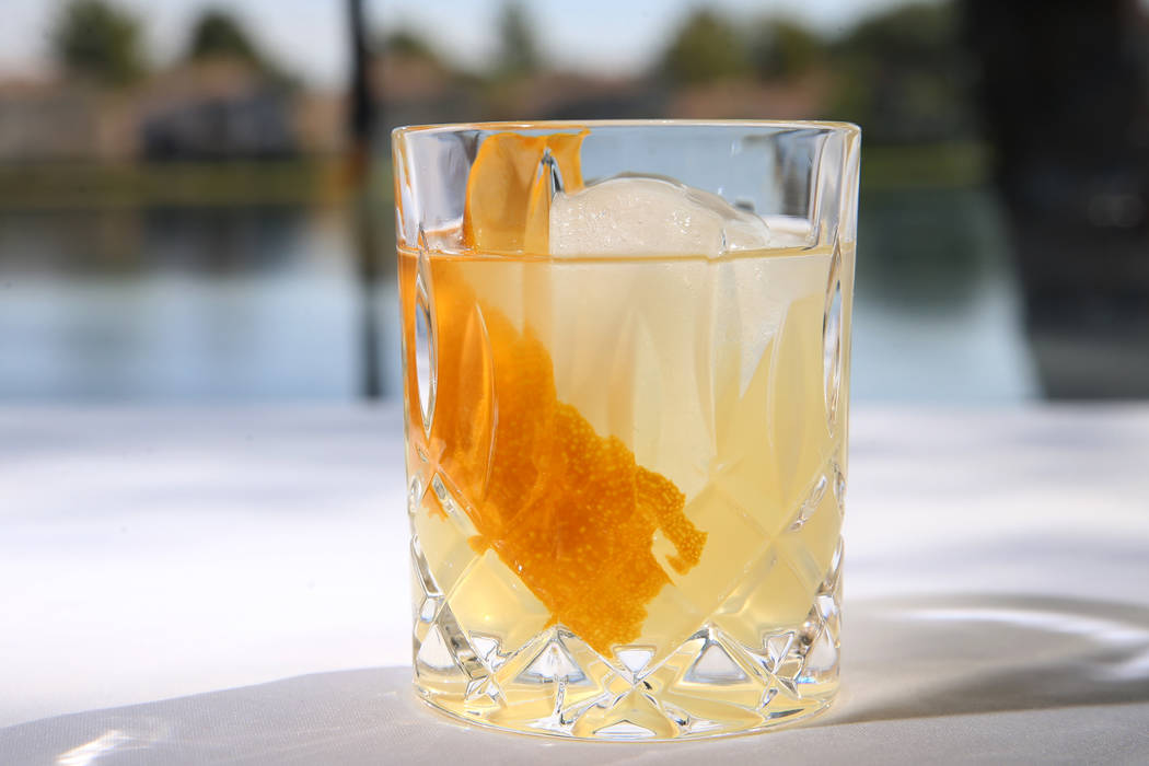 The Clarified Milk Punch cocktail served with gin honey, early grey tea, milk, and brandy, at A ...