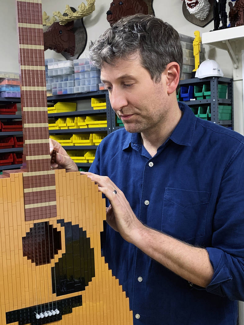 Lego artist Nathan Sawaya builds Phoebe’s guitar for his “Friends” set, which will be dis ...