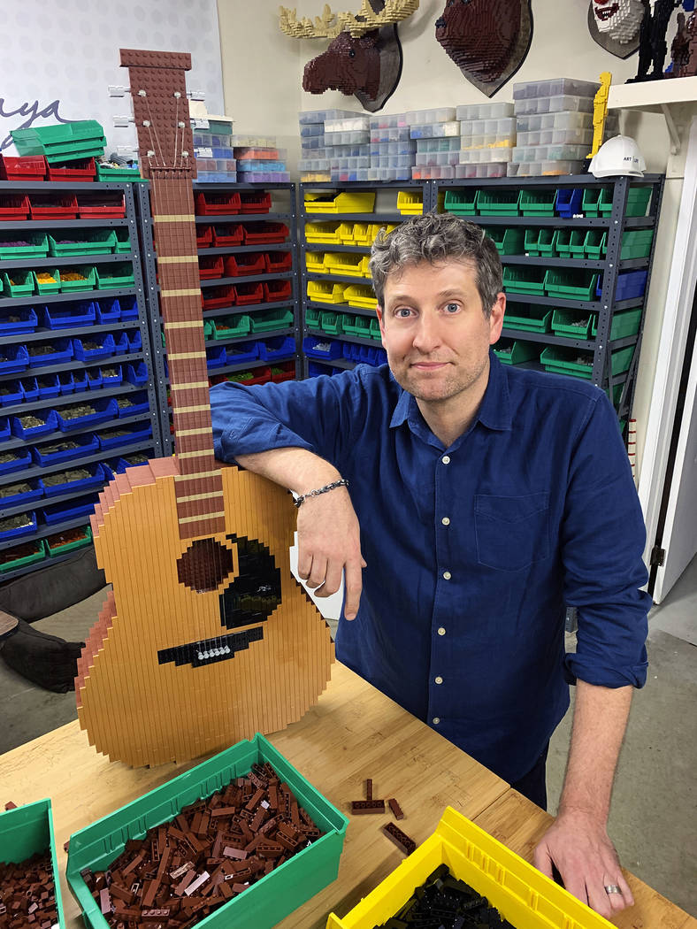 Lego artist Nathan Sawaya builds Phoebe’s guitar for his “Friends” set, which will be dis ...