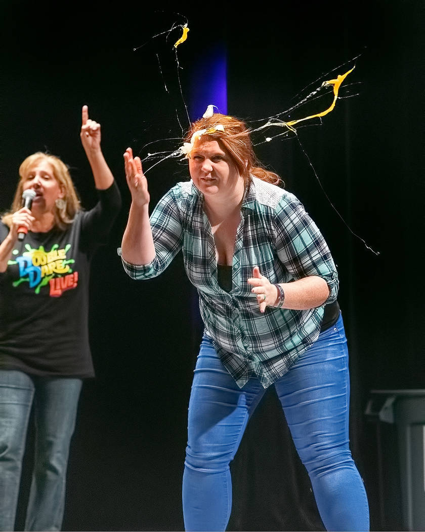 Cracking an egg on one's forehead is one of the games in "Double Dare Live!" (The Smith Center)