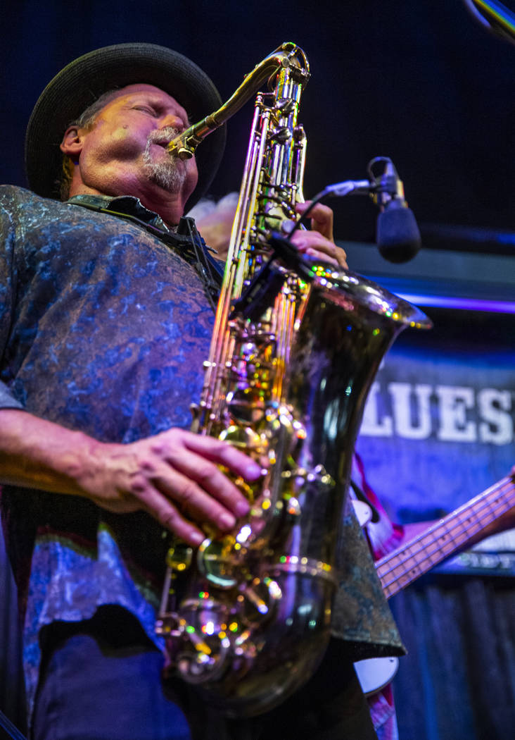 Las Vegas Blues Society President Jimmy Carpenter plays the sax with other musicians during the ...