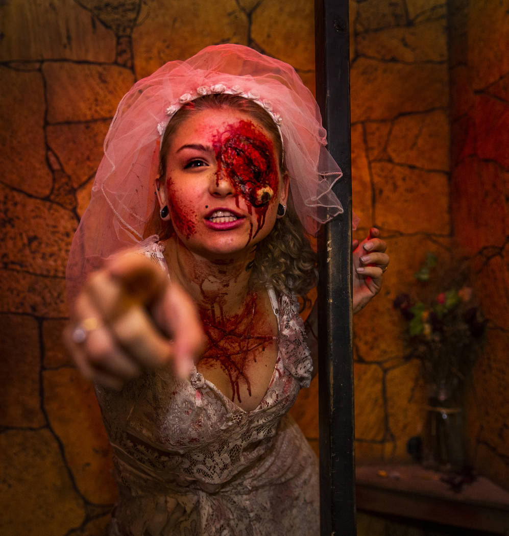 Succubus taunts those who wander within the Gates of Hell haunted house during the Freakling Br ...