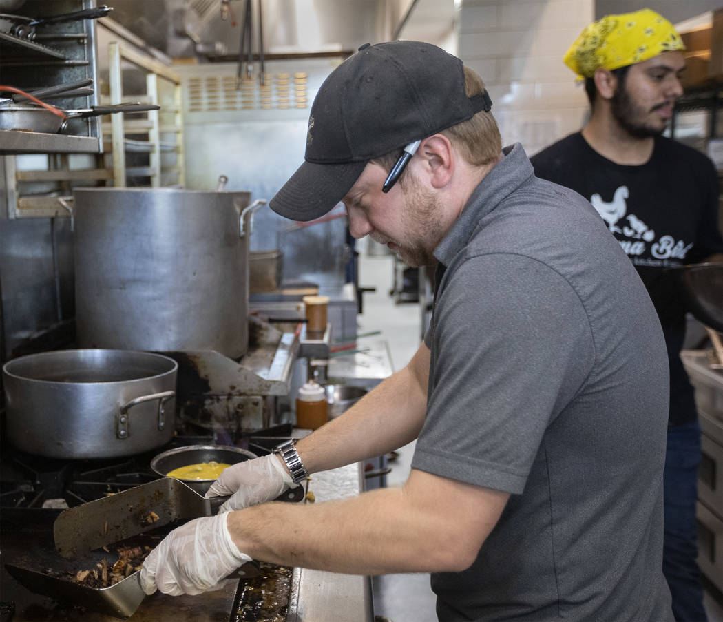 Zachary Substanley, general manager and pitmaster at Mama Bird, cooks a Pitmaster's Scramble on ...