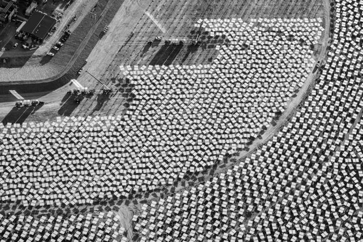 Heliostat installation adjacent to Unit 1 power block. "The Evolution of Ivanpah Solar," featur ...