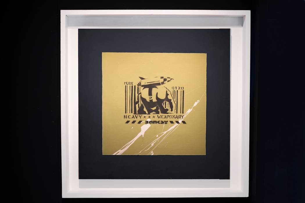 "Heavy Weaponry" is one of the Bansky works in the exhibit. ("Banksy: Genius or Vandal?")