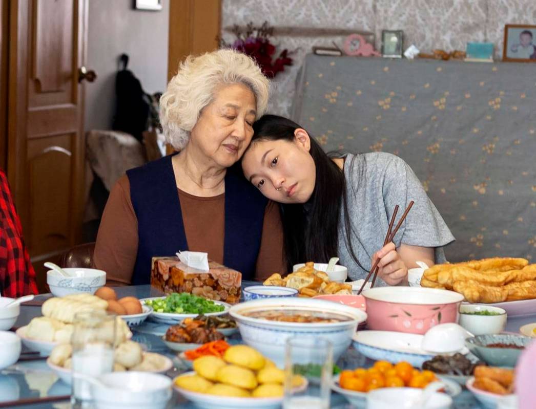 This image released by A24 films shows Zhao Shuzhen, left, and Awkwafina in a scene from " ...
