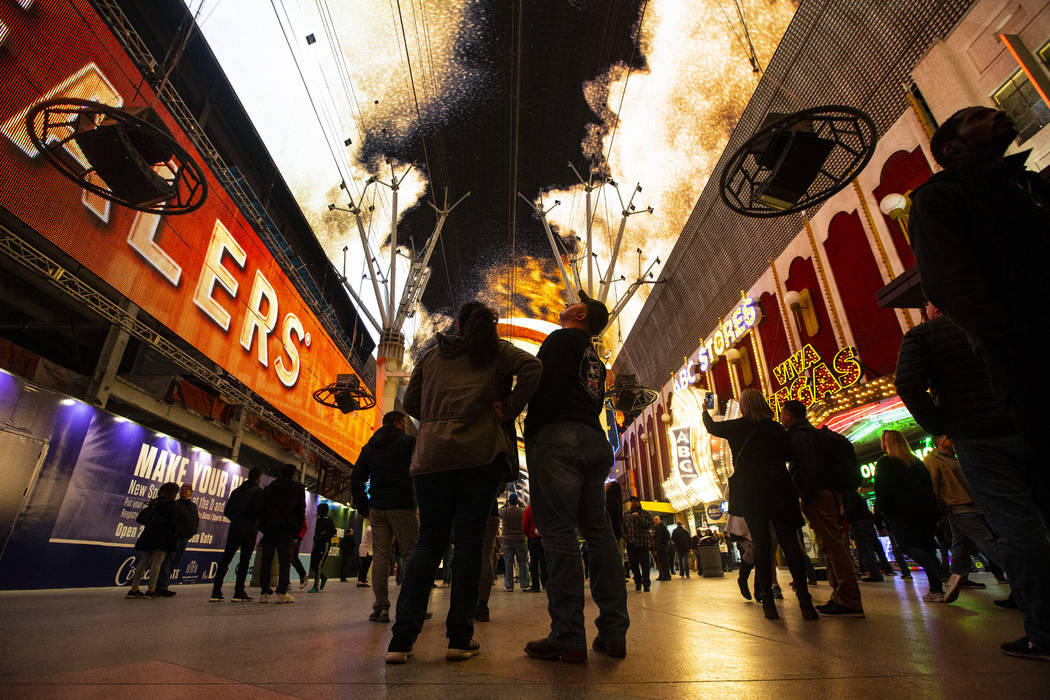 Ariana Gutierrez, left, and Shawnn Herman, both of Ventura, Calif., watch the recently-upgraded ...