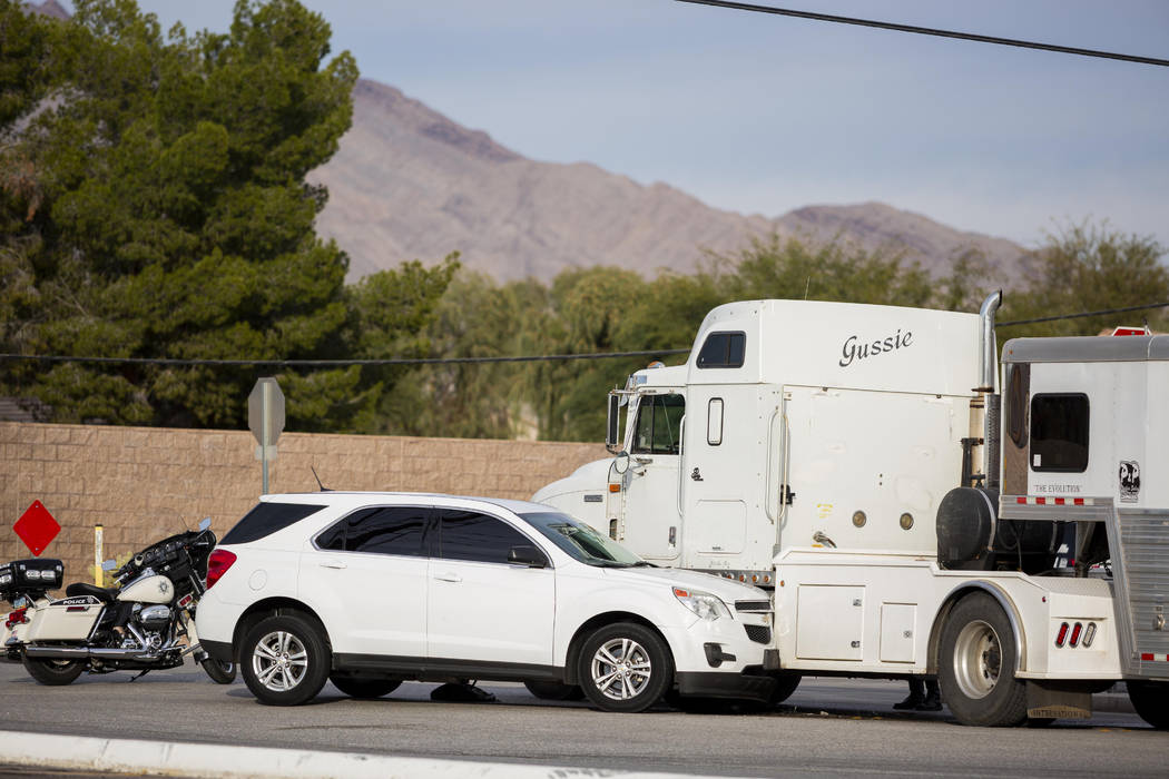 A stolen car crashed into a horse trailer at Flamingo Road and Stephanie Street, near Horseman' ...