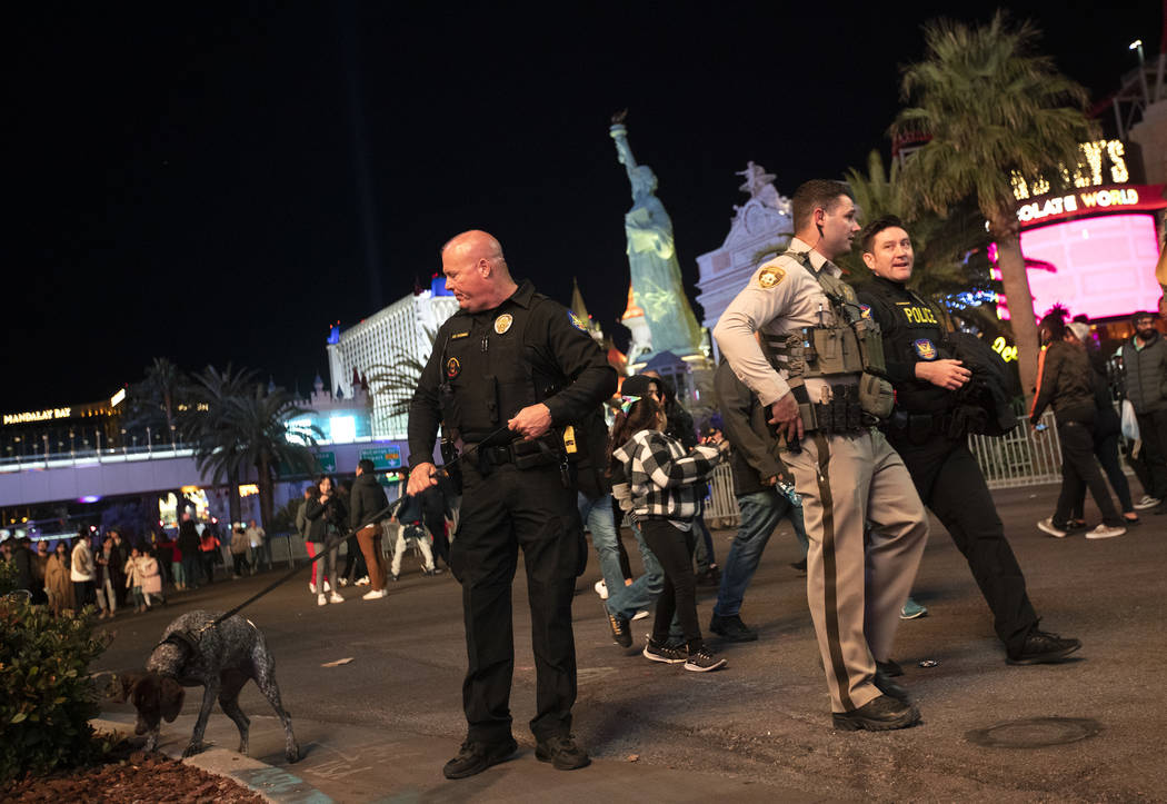 Metropolitan police patrol Las Vegas Boulevard for New Year's Eve on the Strip on Tuesday, Dec. ...