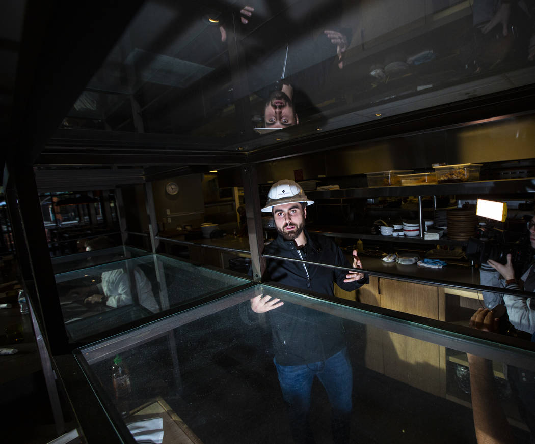 Golden Knights' Alex Tuch talks during a tour of the current Wolfgang Puck Bar & Grill spac ...