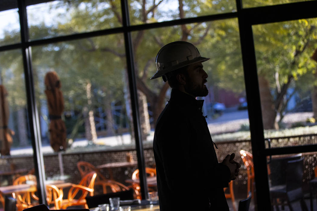 Golden Knights' Alex Tuch talks during a tour of the current Wolfgang Puck Bar & Grill spac ...