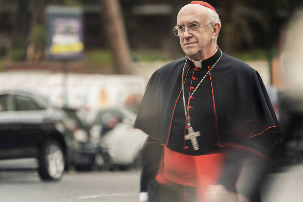 This image released by Netflix shows Jonathan Pryce as Cardinal Bergoglio in a scene from &quot ...