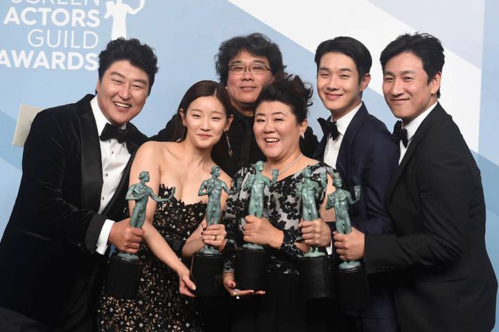 Kang-Ho Song, from left, Park So-dam, Bong Joon-ho, Jang Hye-jin, Choi Woo-shik, and Lee Sun Gy ...