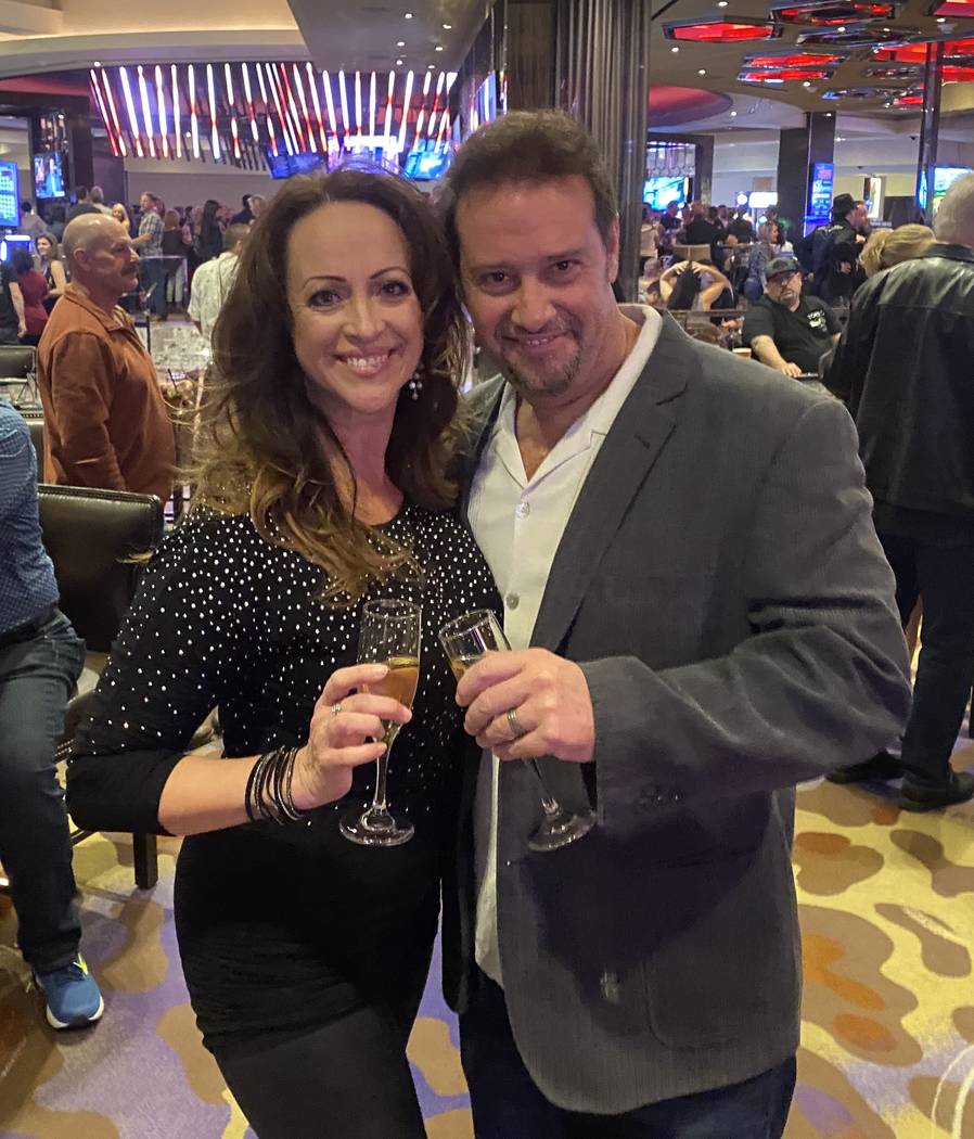 Drew and J.J. Combs, Hard Rock Hotel employees since the hotel opened in 1995, are shown at the ...